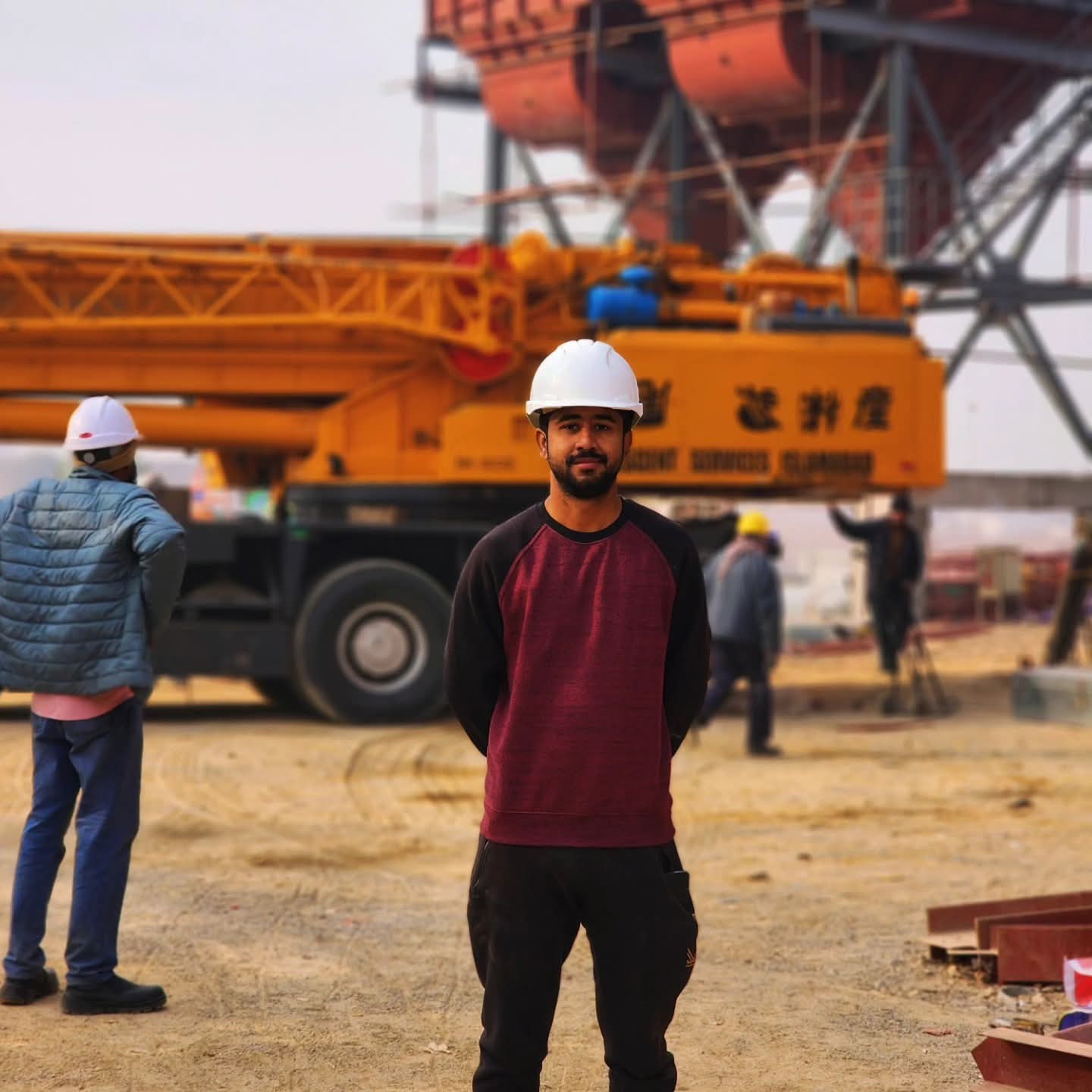 Muhammad Shees Kamal, founder of Kamal Mechanical, on site in a hard hat